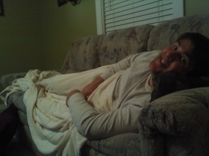 My Dewzy snuggled up on the sofa.